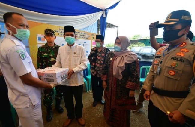 Bupati Masnah Kunjungi Poskotis Idul Fitri 2020