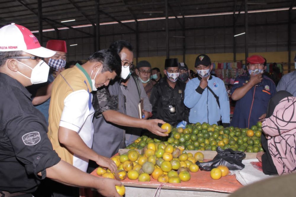 Blusukan di Pasar Siulak, Syafril Dapat Dukungan Dari Pedagang