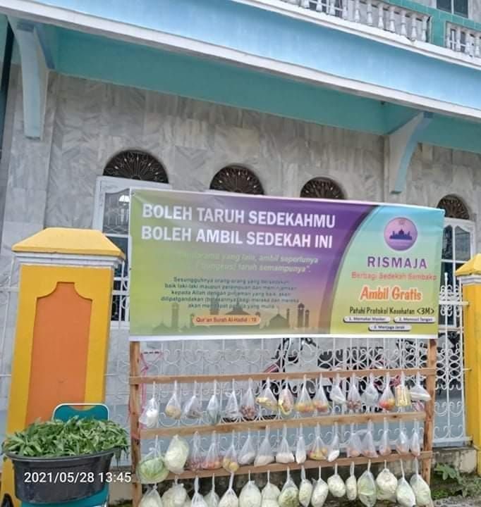 Unik, Warga Siulak Mukai Sedekah Ditengah Pandemi Dengan Cara ini