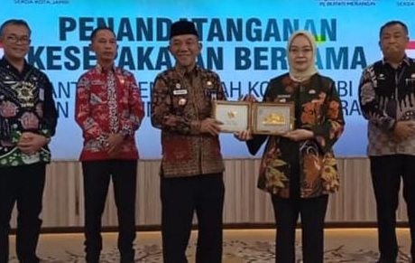 Pj Bupati Merangin Teken MoU dengan Pemkot Jambi