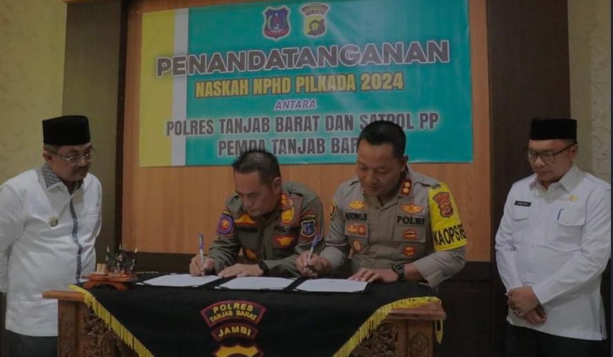 Bupati Saksikan Penandatanganan  NPHD Antara Polres dan Sat Pol-PP Tanjabbar