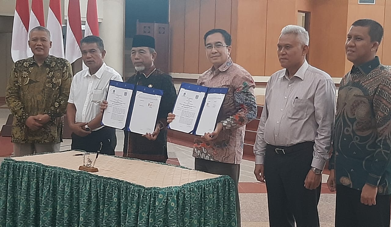 Bupati Merangin Teken MoU dengan UT