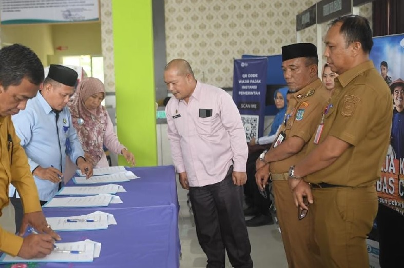 Pj Bupati Merangin Teken MoU dengan Delapan Pimpinan Instansi