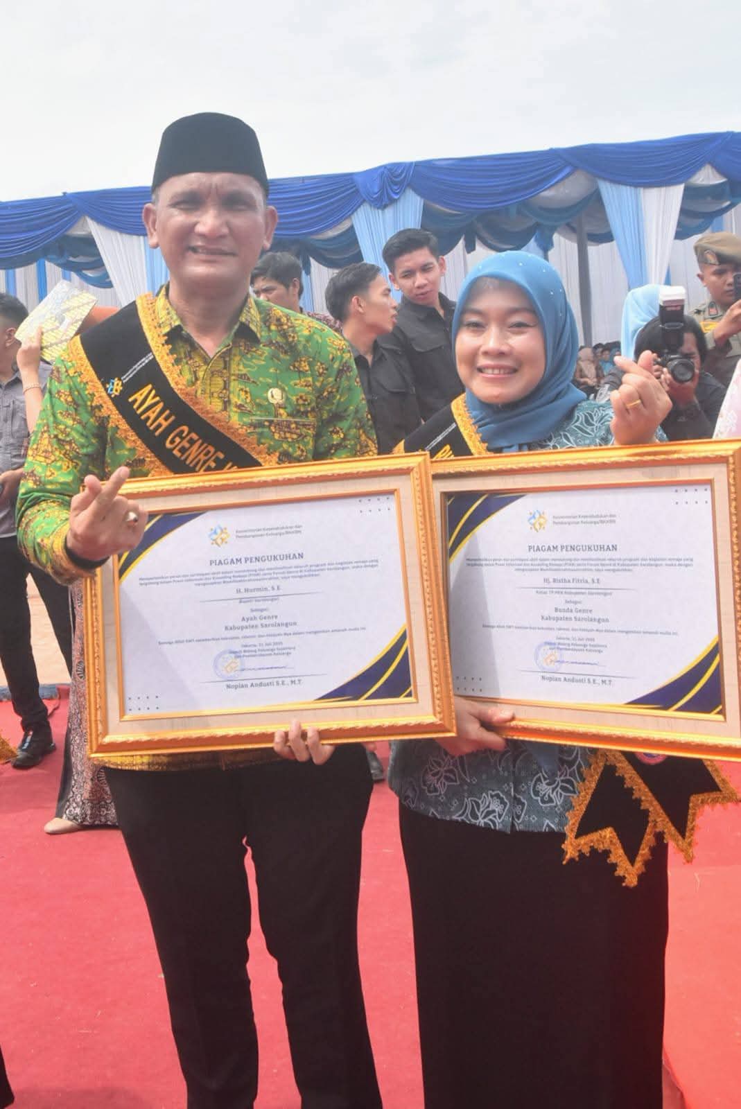Bupati Hurmin dan Hj Risha Fitria Hurmin Dikukuhkan Sebagai Ayah dan Ibu GenRe Saat Harganas