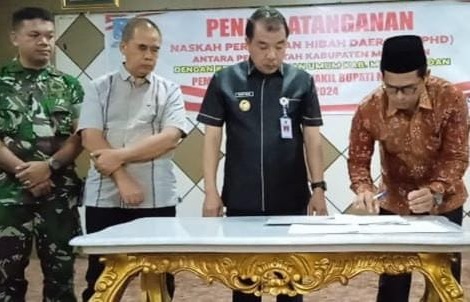 Pj Bupati Merangin Teken NPHD dengan KPU, Kembali Tekankan Netralitas ASN