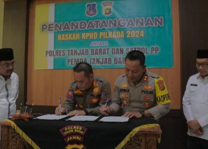 Bupati Saksikan Penandatanganan  NPHD Antara Polres dan Sat Pol-PP Tanjabbar