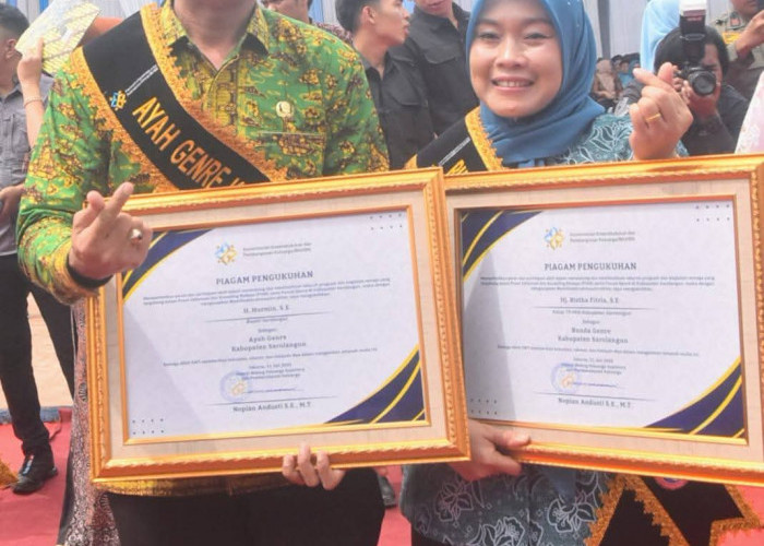 Bupati Hurmin dan Hj Risha Fitria Hurmin Dikukuhkan Sebagai Ayah dan Ibu GenRe Saat Harganas