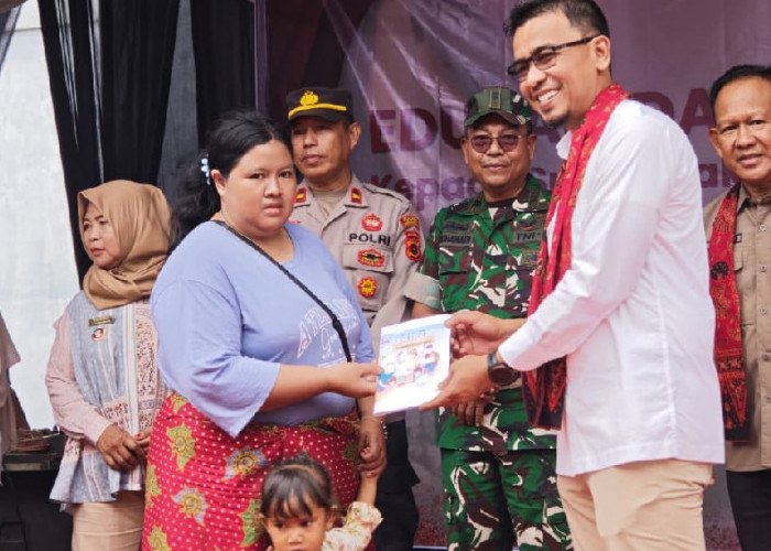Kolaborasi Bank Jambi dan OJK Tingkatkan Edukasi serta Inklusi Keuangan bagi Masyarakat SAD di Merangin 