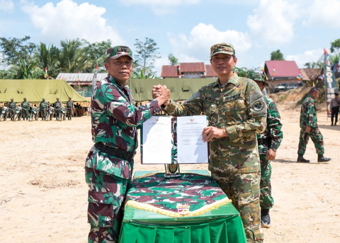 Bupati Batang Hari Selaku Inspektur Upacara Pembukaan TMMD ke 127 di Kab. Batang Hari