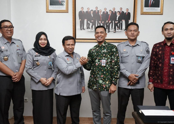 Kunjungan Kerja ke OJK, Kanwil Kemenkum Jambi Perkuat Pengawasan PNBP Jaminan Fidusia