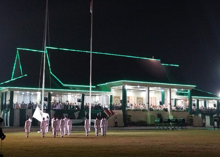 Pengibaran Bendera LPTQ di Pembukaan STQ Sukses 