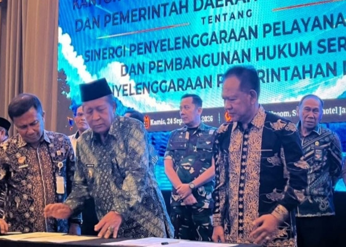 Wabup H A Khafid Teken MoU Pelayanan Hukum dengan Kanwil Kemenkum Jambi
