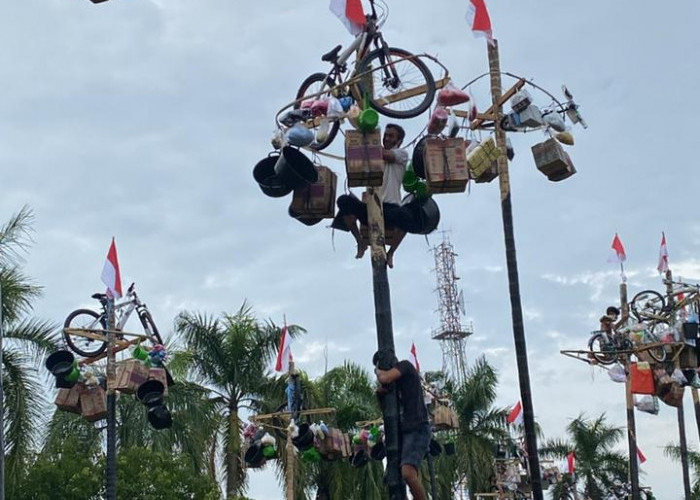 Ribuan Masyarakat Padati Lapangan Kantor Gubernur, Buru Hadiah Jalan Santai Hingga Panjat Pinang 77 Batang