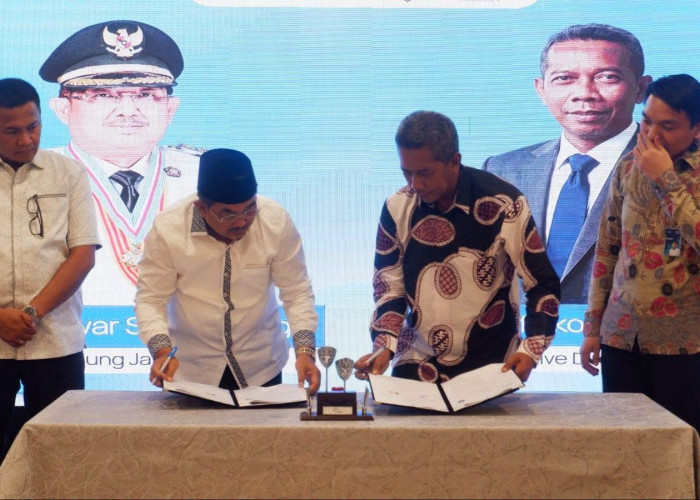 Bupati Anwar Sadat Dorong Peningkatan PAD Lewat MoU Retribusi Pelabuhan Kuala Tungkal Bersama ASDP