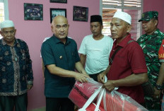 Bupati Dedy Putra Serahkan Bantuan untuk Korban Kebakaran di Dusun Buat