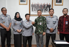 Kunjungan Kerja ke OJK, Kanwil Kemenkum Jambi Perkuat Pengawasan PNBP Jaminan Fidusia