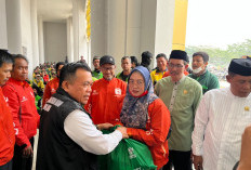 Gubernur Al Haris Salurkan 250 Paket Sembako dan Masker untuk Ojol Terdampak Kabut Asap