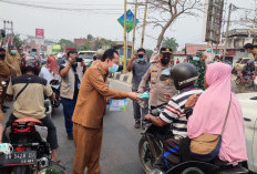 Kabut Asap Pekat, Bupati Muaro Jambi Bagikan Ribuan Masker
