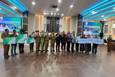 Launching Perlindungan 3.329 Pekerja Rentan di Bungo melalui DBH Sawit