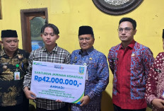 Ahli Waris Ketua RT Terima Santunan JKM BPJS Ketenagakerjaan